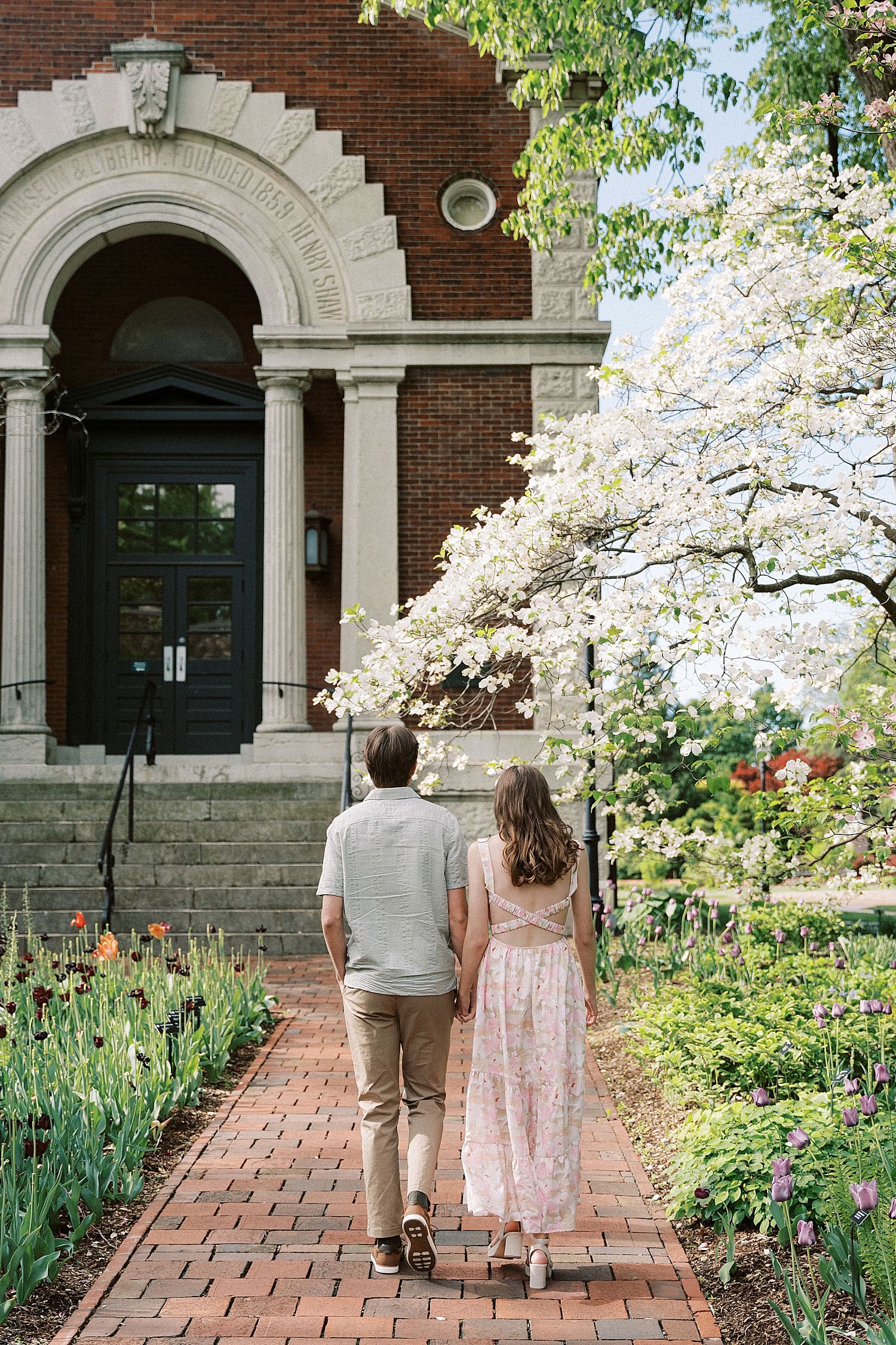 man and woman walking up a path for wandering session