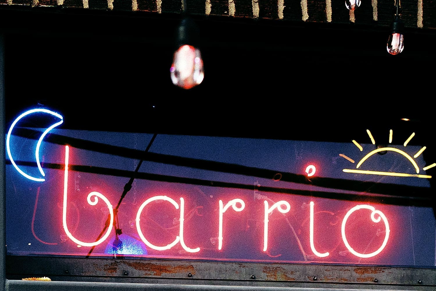 light up sign saying Barrio at local bar by Camille Meers Photography