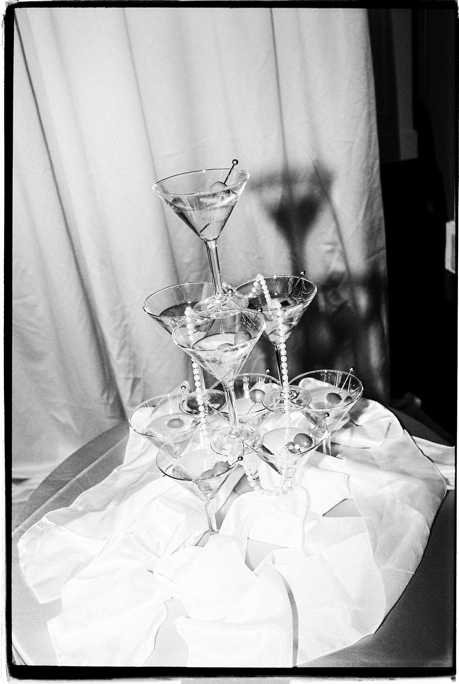 small champagne tower with martini glasses by St. Louis wedding photographer