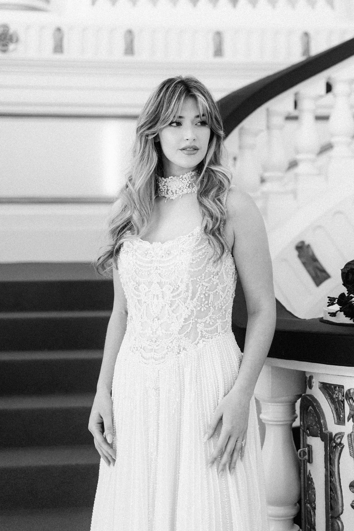 bride with bangs on staircase at Powell Hall